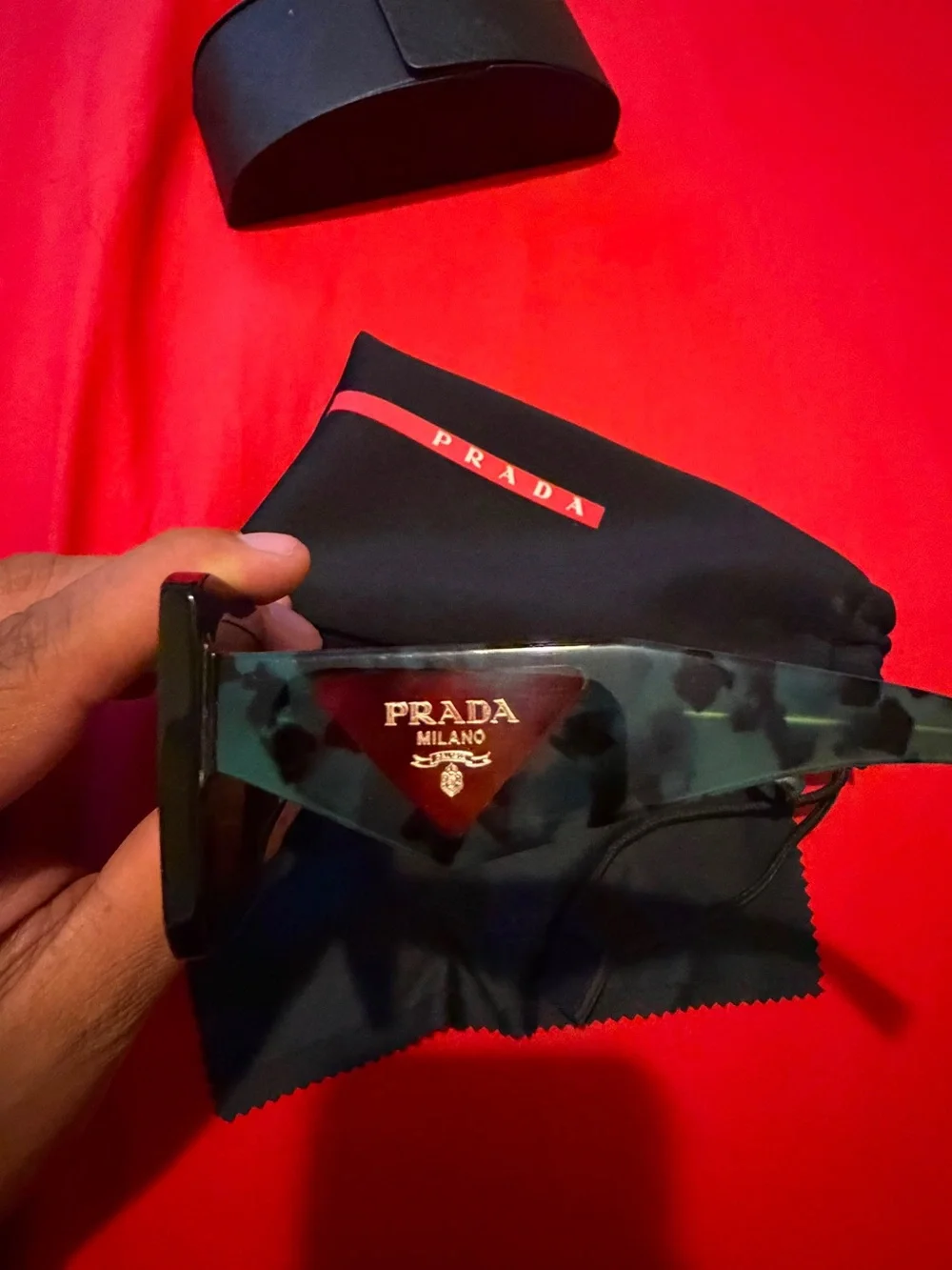 Prada Teal Tortoise Acetate Sunglasses with Gold Logo